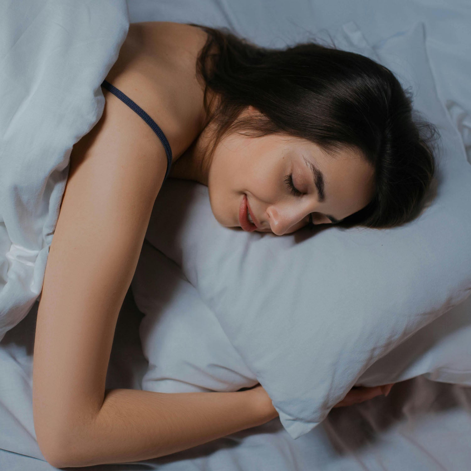 woman sleeping on the bed